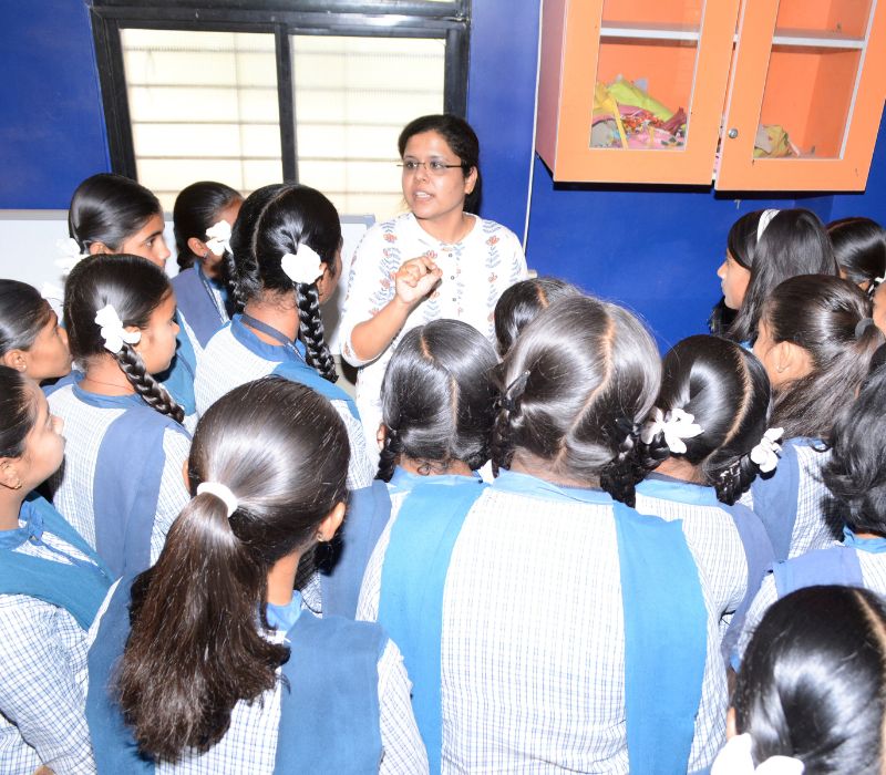 Dnyaneshwari mam talking to students